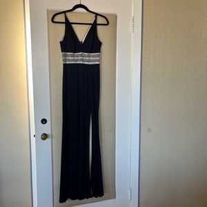 Navy blue Aqua gown. Worn once, excellent condition. Size 2. Originally $300.